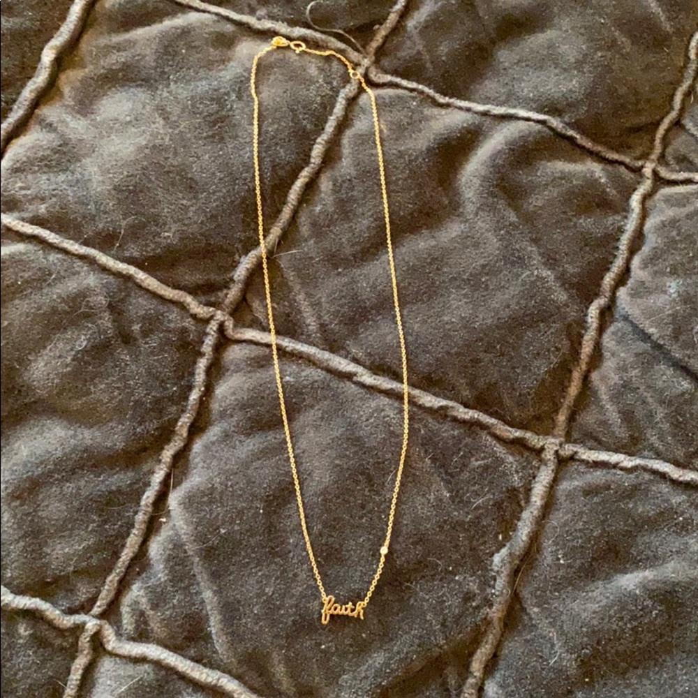 Gold “faith” necklace with diamond